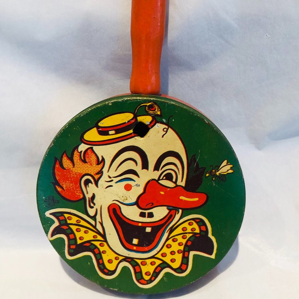 Vintage US Metal Toy Noise Maker / Clown / Wooden Handle / Litho Circus